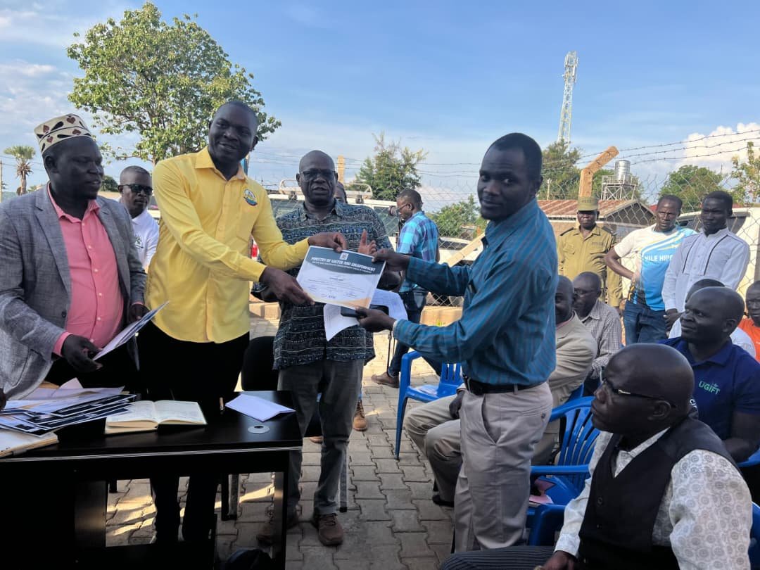 TECHNICAL HANDOVER OF RHINO CAMP PIPED WATER SUPPLY AND SANITATION FACILITIES IN MADI-OKOLLO DISTRICT TO NORTHERN UMBRELLA FOR OPERATIONS AND MAINTENANCE
