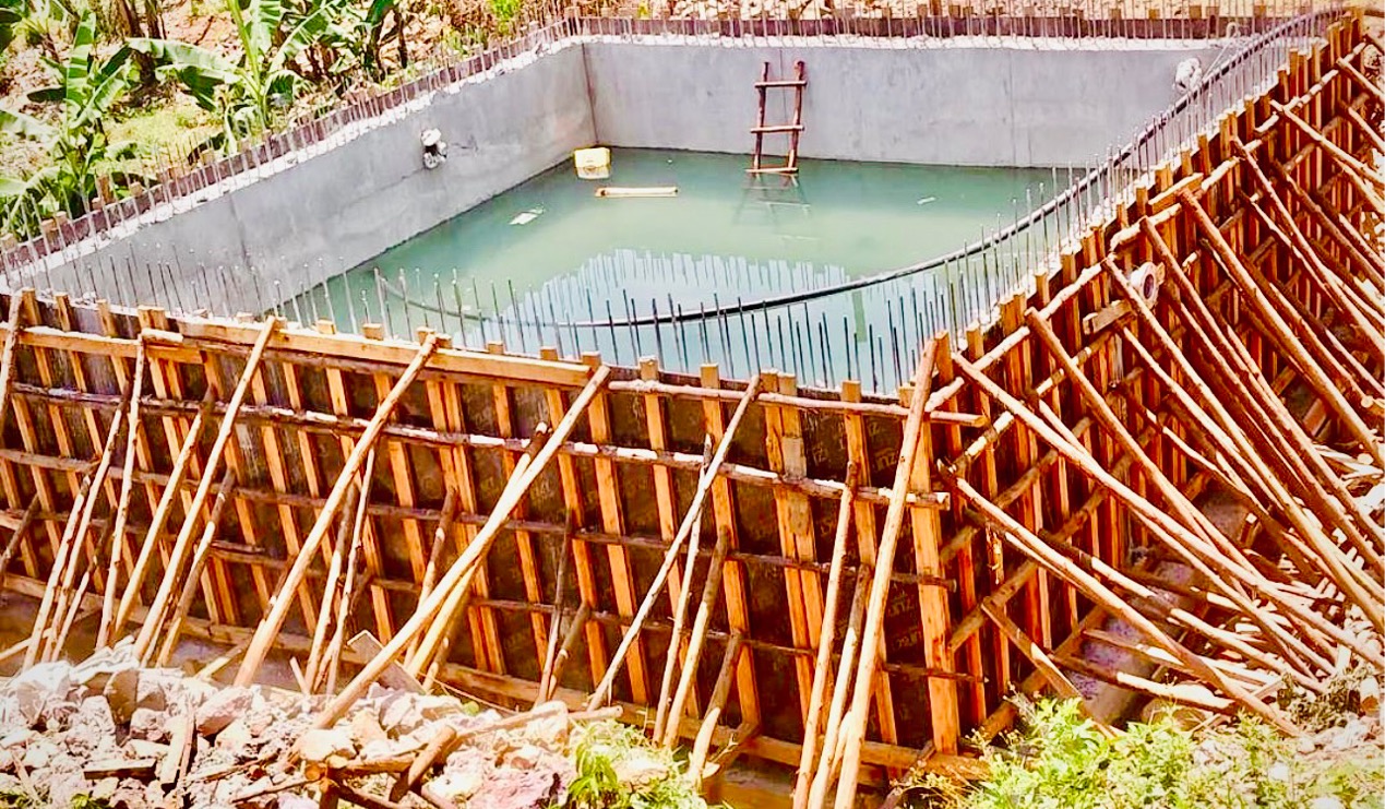 The new collection tank for Lunya Water Supply System under construction.