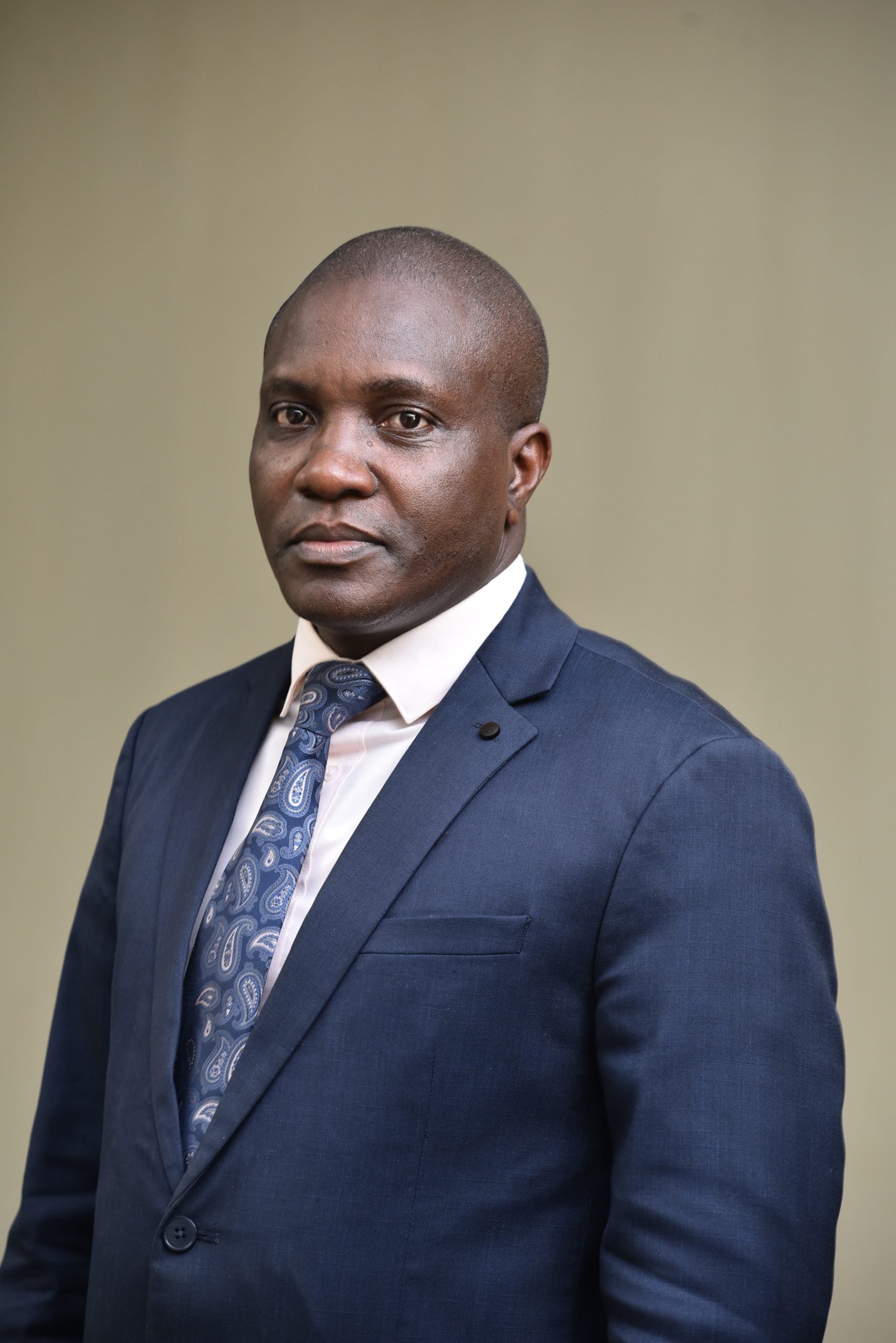 Mr. Raphael Lubega, Principal Assistant Secretary