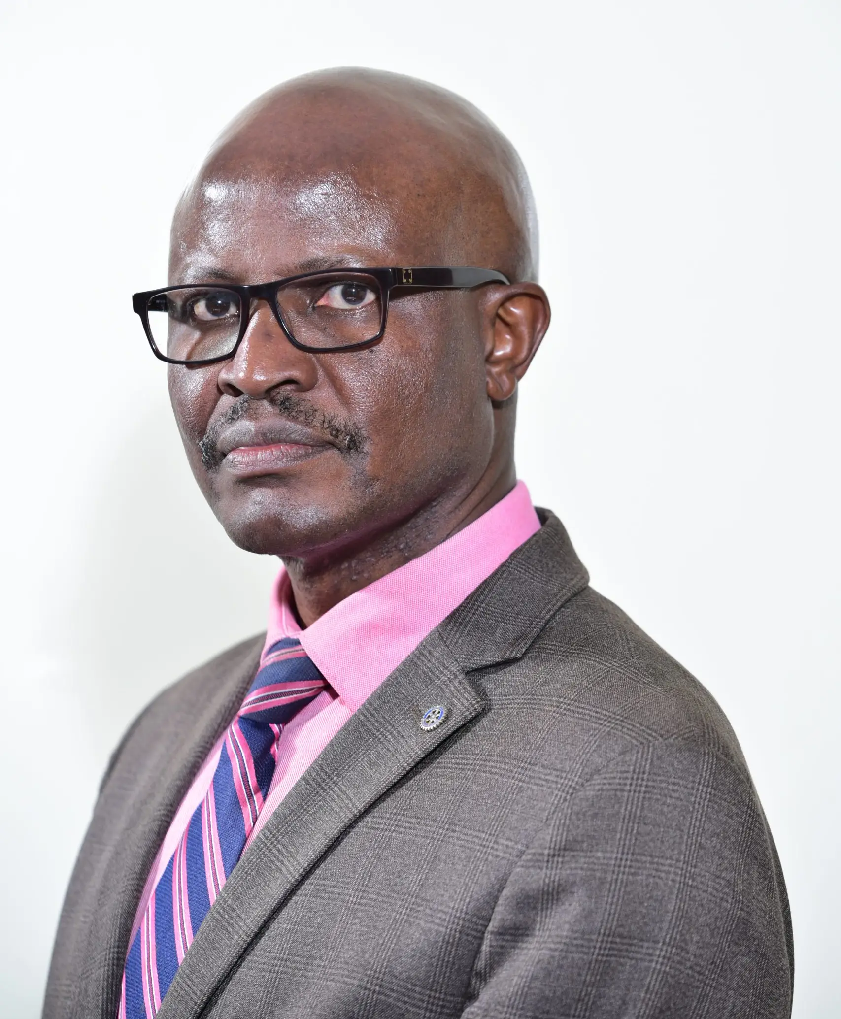 Mr. Mike Duncan Tumwikirize, Assistant Commissioner